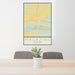 24x36 Magazine Arkansas Map Print Portrait Orientation in Woodblock Style Behind 2 Chairs Table and Potted Plant