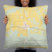 Person holding 22x22 Custom Magazine Arkansas Map Throw Pillow in Woodblock