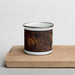 Front View Custom Magnolia Texas Map Enamel Mug in Ember on Cutting Board