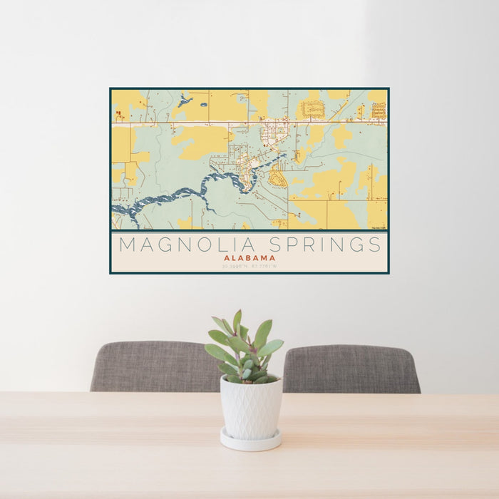 24x36 Magnolia Springs Alabama Map Print Lanscape Orientation in Woodblock Style Behind 2 Chairs Table and Potted Plant