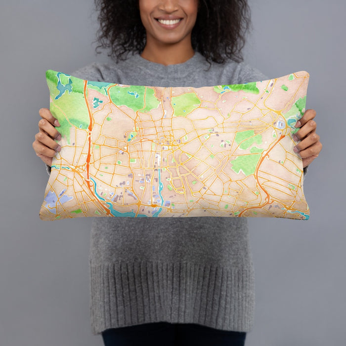 Person holding 20x12 Custom Malden Massachusetts Map Throw Pillow in Watercolor