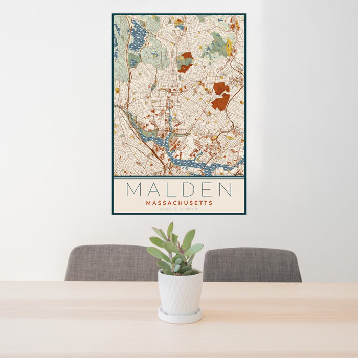24x36 Malden Massachusetts Map Print Portrait Orientation in Woodblock Style Behind 2 Chairs Table and Potted Plant
