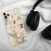 Custom Malden Massachusetts Map Phone Case in Woodblock on Table with Black Headphones