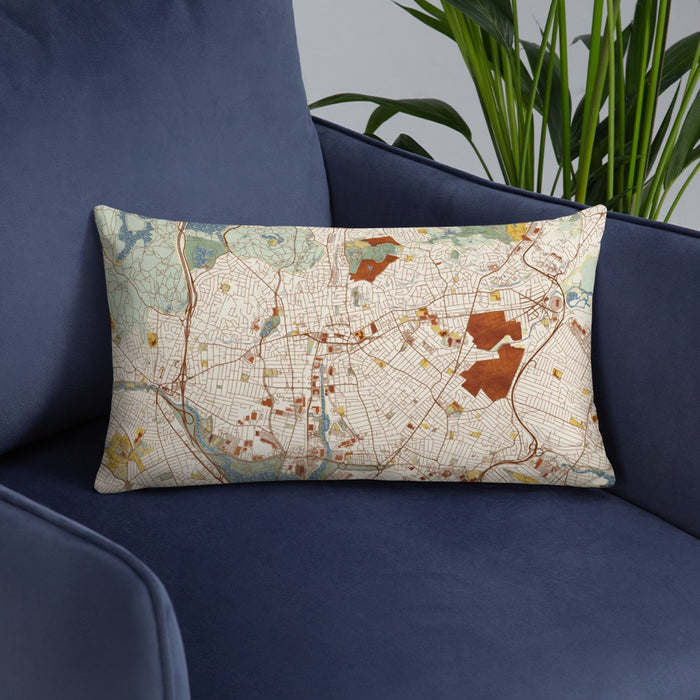Custom Malden Massachusetts Map Throw Pillow in Woodblock on Blue Colored Chair