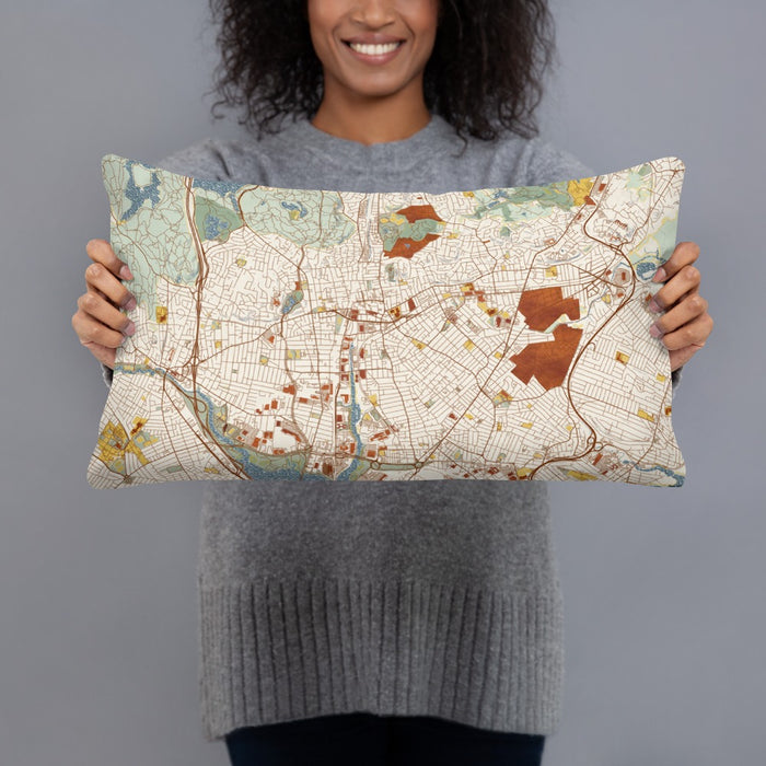 Person holding 20x12 Custom Malden Massachusetts Map Throw Pillow in Woodblock
