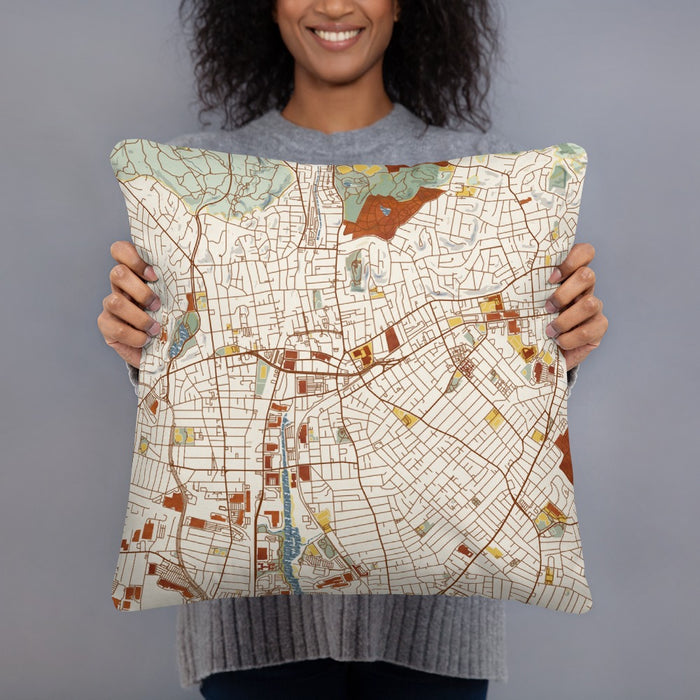 Person holding 18x18 Custom Malden Massachusetts Map Throw Pillow in Woodblock