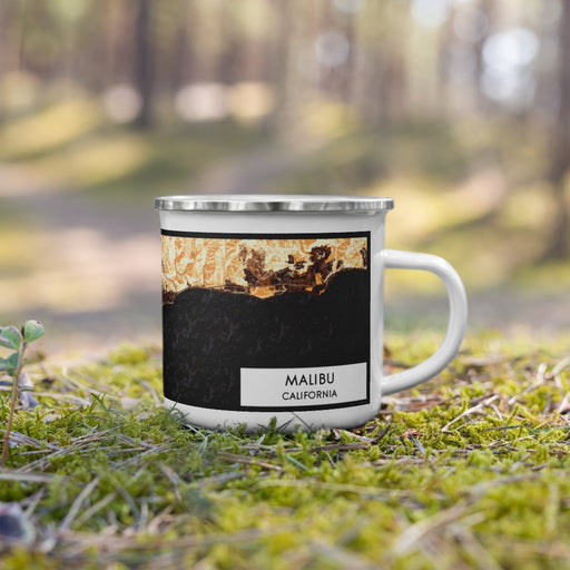 Right View Custom Malibu California Map Enamel Mug in Ember on Grass With Trees in Background
