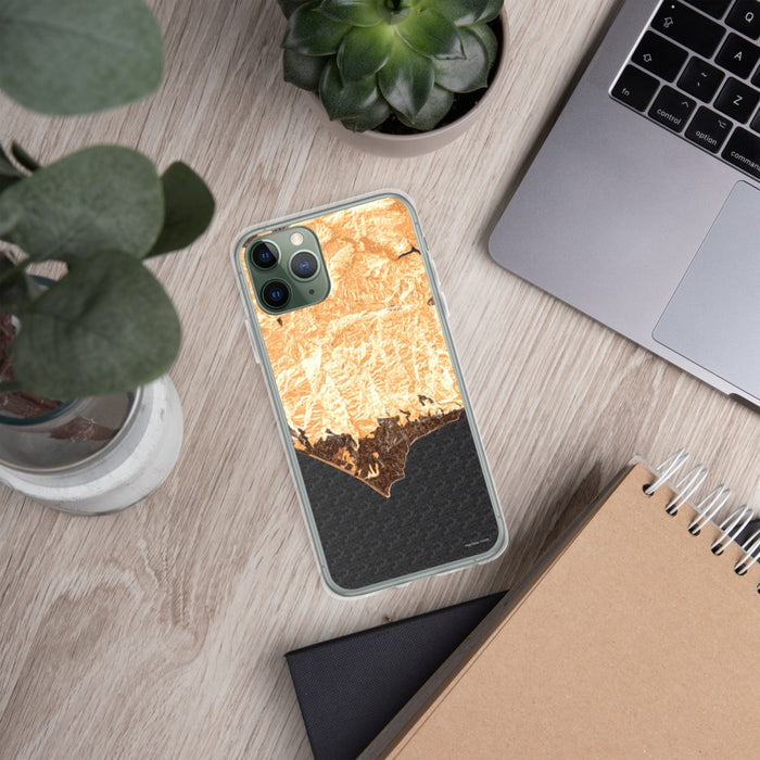 Custom Malibu California Map Phone Case in Ember on Table with Laptop and Plant