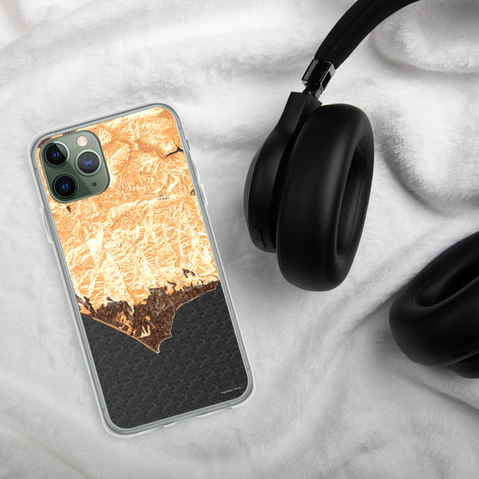 Custom Malibu California Map Phone Case in Ember on Table with Black Headphones
