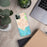 Custom Malibu California Map Phone Case in Watercolor on Table with Laptop and Plant