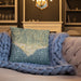 Custom Malibu California Map Throw Pillow in Woodblock on Cream Colored Couch