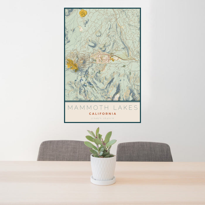 24x36 Mammoth Lakes California Map Print Portrait Orientation in Woodblock Style Behind 2 Chairs Table and Potted Plant