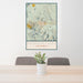 24x36 Mammoth Lakes California Map Print Portrait Orientation in Woodblock Style Behind 2 Chairs Table and Potted Plant
