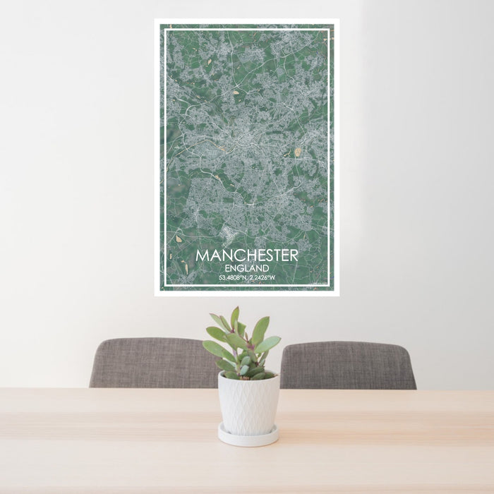 24x36 Manchester England Map Print Portrait Orientation in Afternoon Style Behind 2 Chairs Table and Potted Plant