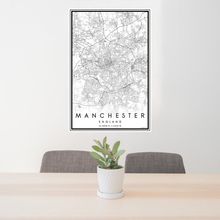 24x36 Manchester England Map Print Portrait Orientation in Classic Style Behind 2 Chairs Table and Potted Plant