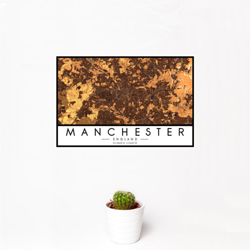 12x18 Manchester England Map Print Landscape Orientation in Ember Style With Small Cactus Plant in White Planter