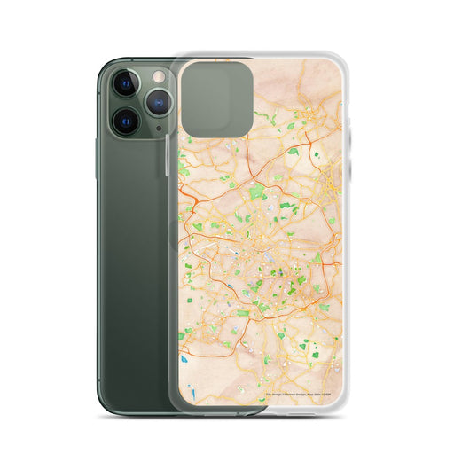 Custom Manchester England Map Phone Case in Watercolor on Table with Laptop and Plant