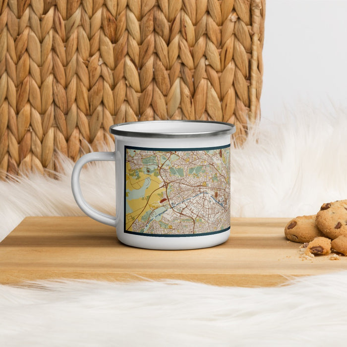 Left View Custom Manchester England Map Enamel Mug in Woodblock on Table Top