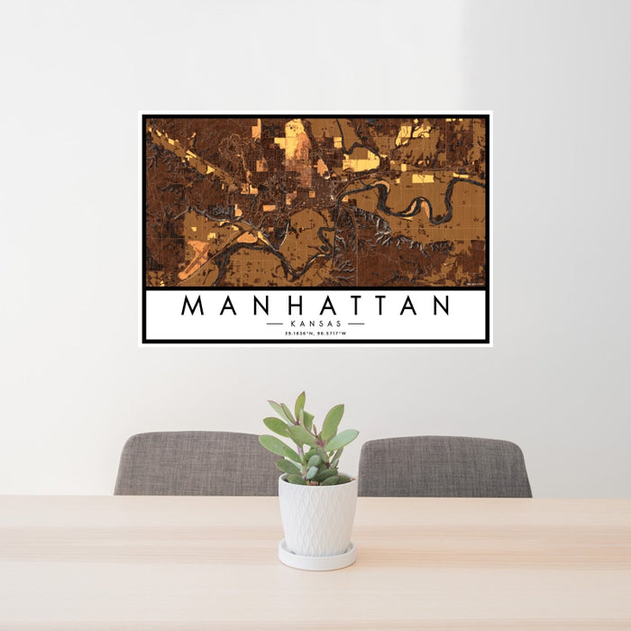24x36 Manhattan Kansas Map Print Landscape Orientation in Ember Style Behind 2 Chairs Table and Potted Plant