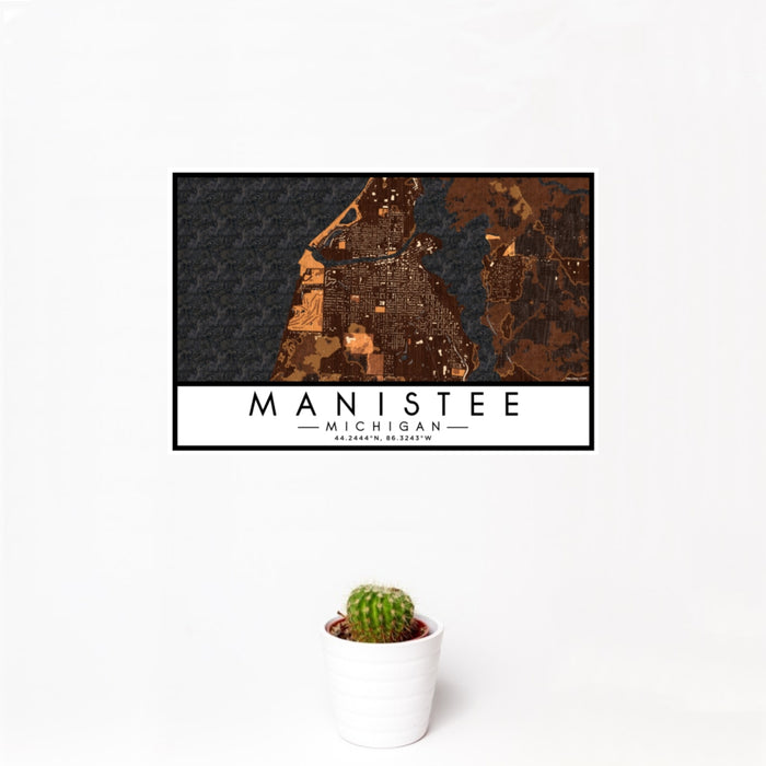 12x18 Manistee Michigan Map Print Landscape Orientation in Ember Style With Small Cactus Plant in White Planter