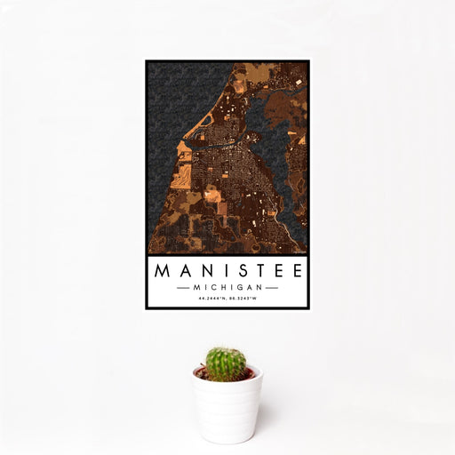 12x18 Manistee Michigan Map Print Portrait Orientation in Ember Style With Small Cactus Plant in White Planter