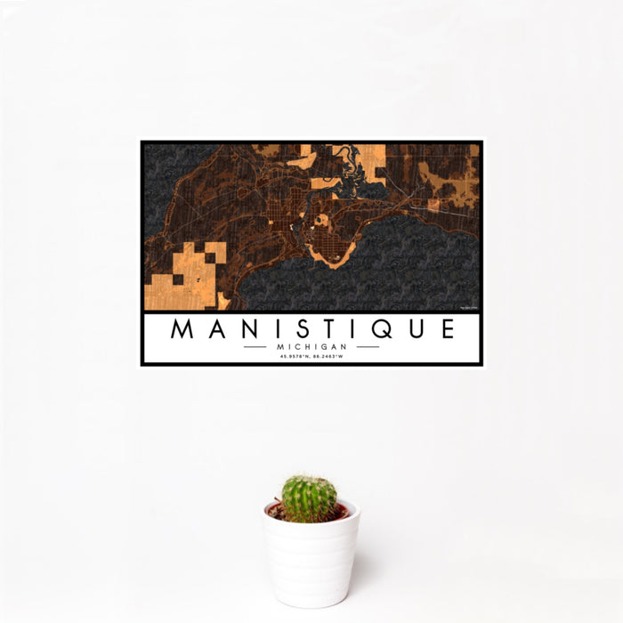12x18 Manistique Michigan Map Print Landscape Orientation in Ember Style With Small Cactus Plant in White Planter