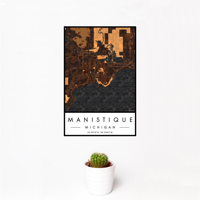 12x18 Manistique Michigan Map Print Portrait Orientation in Ember Style With Small Cactus Plant in White Planter