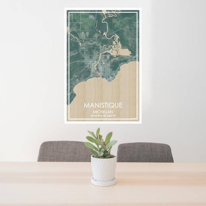 24x36 Manistique Michigan Map Print Portrait Orientation in Afternoon Style Behind 2 Chairs Table and Potted Plant