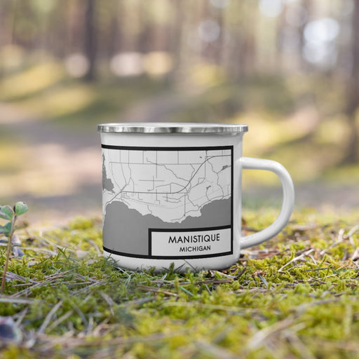 Right View Custom Manistique Michigan Map Enamel Mug in Classic on Grass With Trees in Background