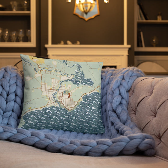 Custom Manistique Michigan Map Throw Pillow in Woodblock on Cream Colored Couch