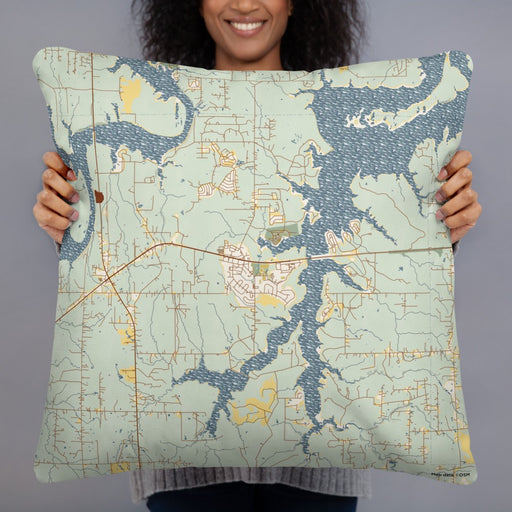 Person holding 22x22 Custom Mannford Oklahoma Map Throw Pillow in Woodblock