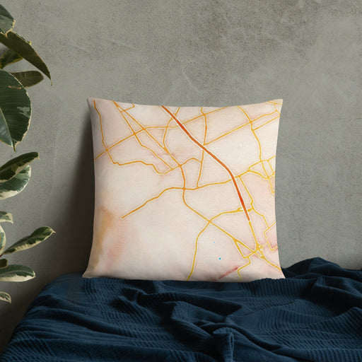 Custom Mansfield Texas Map Throw Pillow in Watercolor on Bedding Against Wall