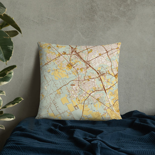 Custom Mansfield Texas Map Throw Pillow in Woodblock on Bedding Against Wall