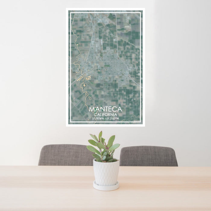 24x36 Manteca California Map Print Portrait Orientation in Afternoon Style Behind 2 Chairs Table and Potted Plant