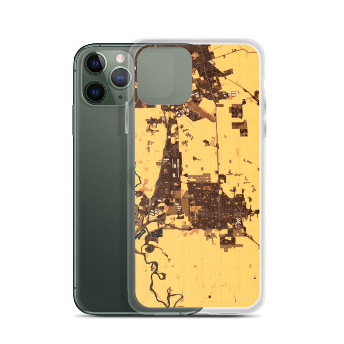 Custom Manteca California Map Phone Case in Ember on Table with Laptop and Plant