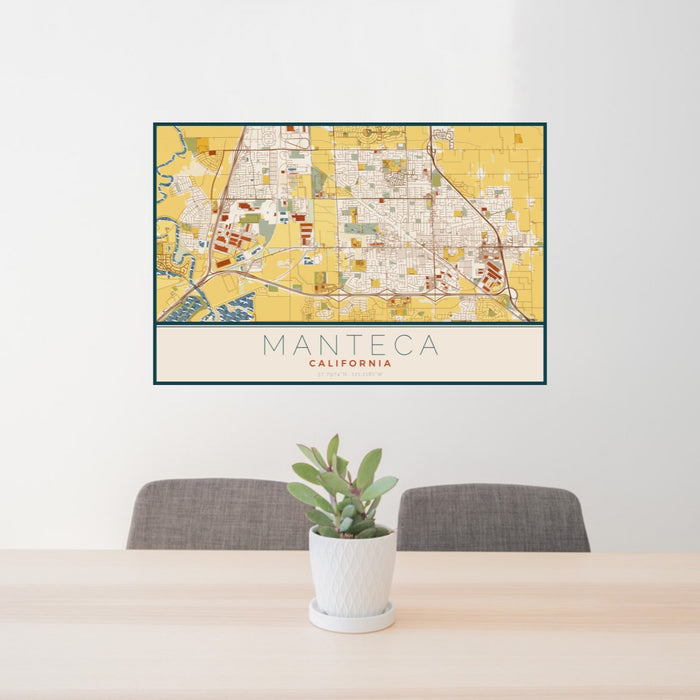 24x36 Manteca California Map Print Landscape Orientation in Woodblock Style Behind 2 Chairs Table and Potted Plant