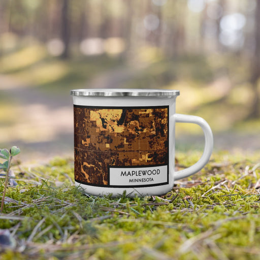 Right View Custom Maplewood Minnesota Map Enamel Mug in Ember on Grass With Trees in Background