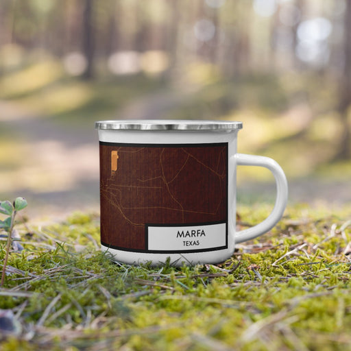 Right View Custom Marfa Texas Map Enamel Mug in Ember on Grass With Trees in Background