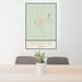 24x36 Marfa Texas Map Print Portrait Orientation in Woodblock Style Behind 2 Chairs Table and Potted Plant