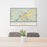 24x36 Margaretville New York Map Print Lanscape Orientation in Woodblock Style Behind 2 Chairs Table and Potted Plant