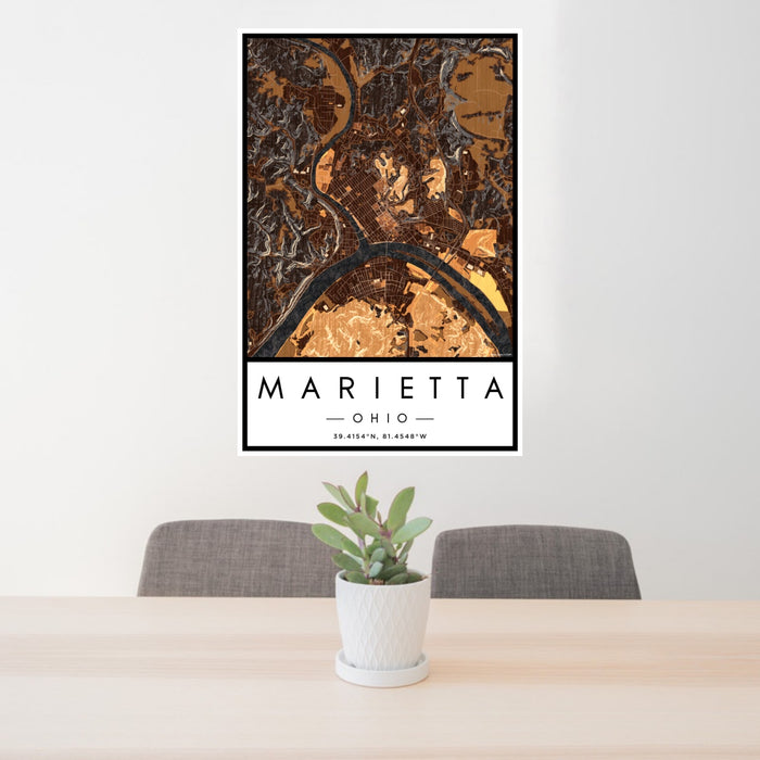 24x36 Marietta Ohio Map Print Portrait Orientation in Ember Style Behind 2 Chairs Table and Potted Plant