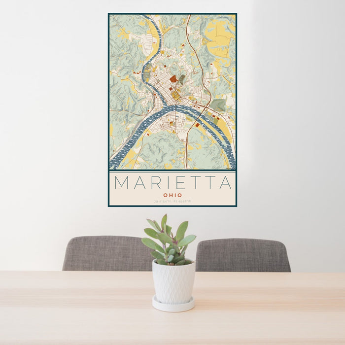 24x36 Marietta Ohio Map Print Portrait Orientation in Woodblock Style Behind 2 Chairs Table and Potted Plant