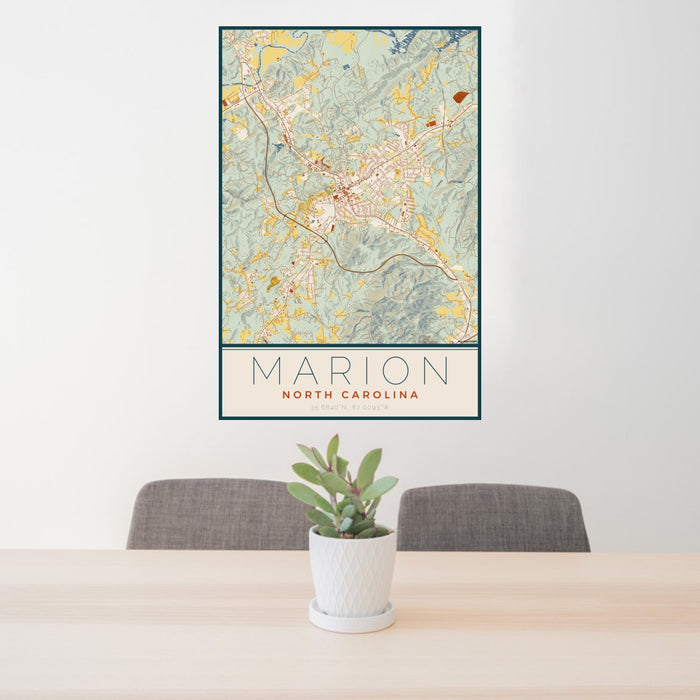 24x36 Marion North Carolina Map Print Portrait Orientation in Woodblock Style Behind 2 Chairs Table and Potted Plant
