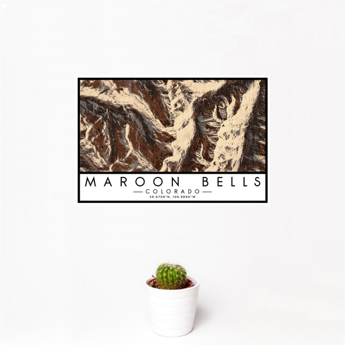 12x18 Maroon Bells Colorado Map Print Landscape Orientation in Ember Style With Small Cactus Plant in White Planter