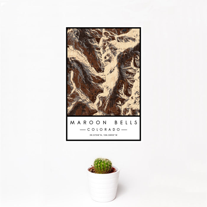 12x18 Maroon Bells Colorado Map Print Portrait Orientation in Ember Style With Small Cactus Plant in White Planter