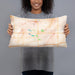 Person holding 20x12 Custom Mason City Iowa Map Throw Pillow in Watercolor