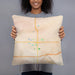 Person holding 18x18 Custom Mason City Iowa Map Throw Pillow in Watercolor