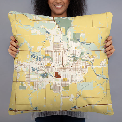 Person holding 22x22 Custom Mason City Iowa Map Throw Pillow in Woodblock