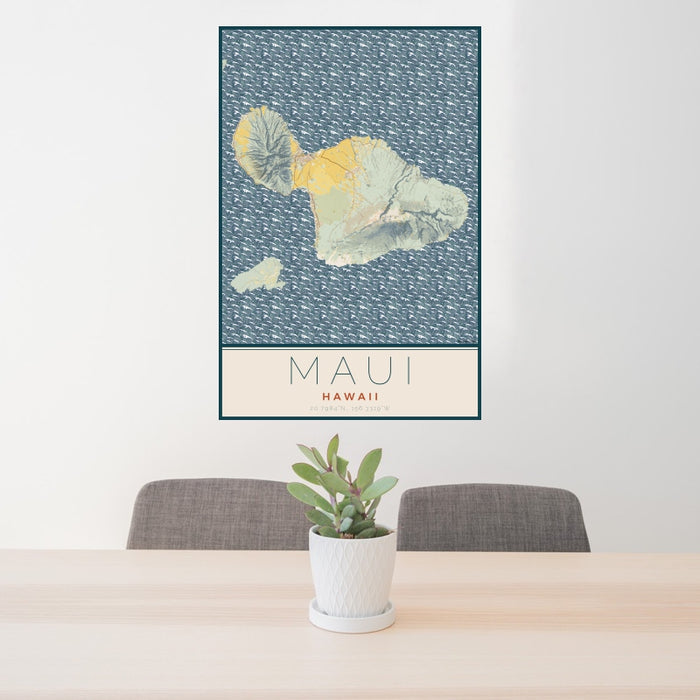 24x36 Maui Hawaii Map Print Portrait Orientation in Woodblock Style Behind 2 Chairs Table and Potted Plant