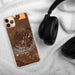 Custom Mauna Kea Hawaii Map Phone Case in Ember on Table with Black Headphones